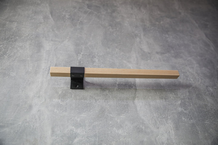 elegant-storage-solution-with-a-wooden-rail-perfect-for-towels