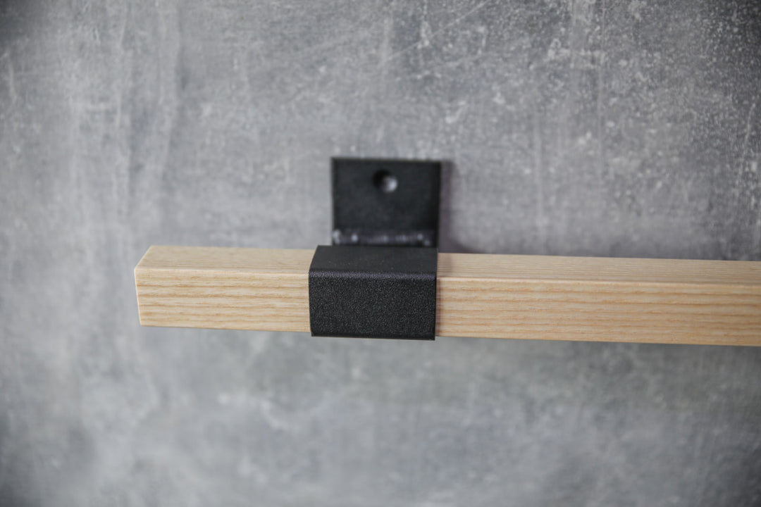 elegant-storage-solution-with-a-wooden-rail-perfect-for-towels