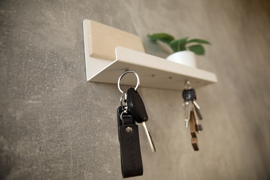 Modern-wall-mounted-magnetic-key-holder-with-metal-shelf-and-wooden-accent-Features-strong-magnets-for-securely-holding-keys-and-small-items-Ideal-for-home-or-office-organization