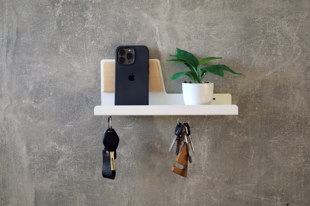 Modern-wall-mounted-magnetic-key-holder-with-metal-shelf-and-wooden-accent-Features-strong-magnets-for-securely-holding-keys-and-small-items-Ideal-for-home-or-office-organization