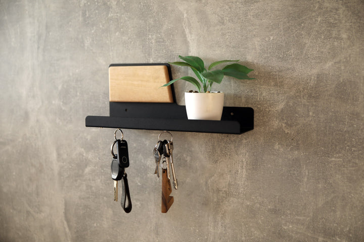 Modern-wall-mounted-magnetic-key-holder-with-metal-shelf-and-wooden-accent-Features-strong-magnets-for-securely-holding-keys-and-small-items-Ideal-for-home-or-office-organization