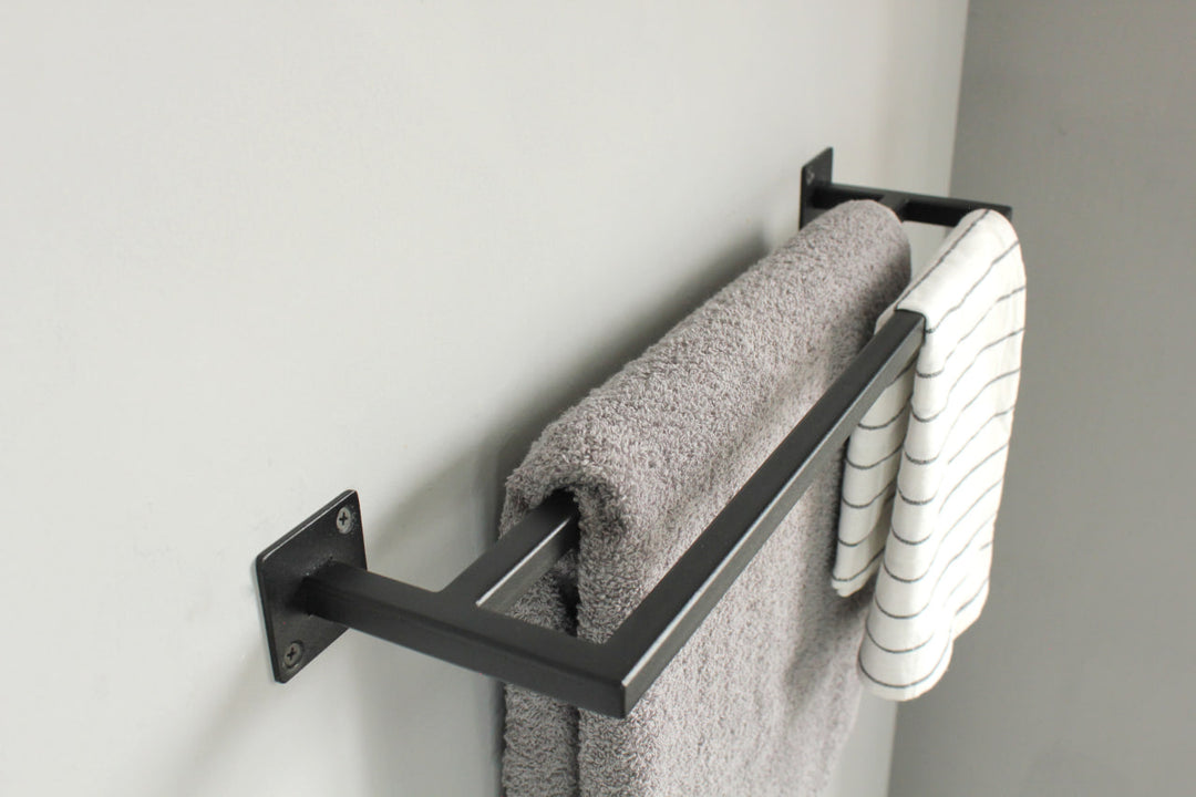towel-rack-with-multiple-bars-for-hanging-towels-sturdy-metal-frame