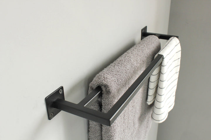 towel-rack-with-multiple-bars-for-hanging-towels-sturdy-metal-frame