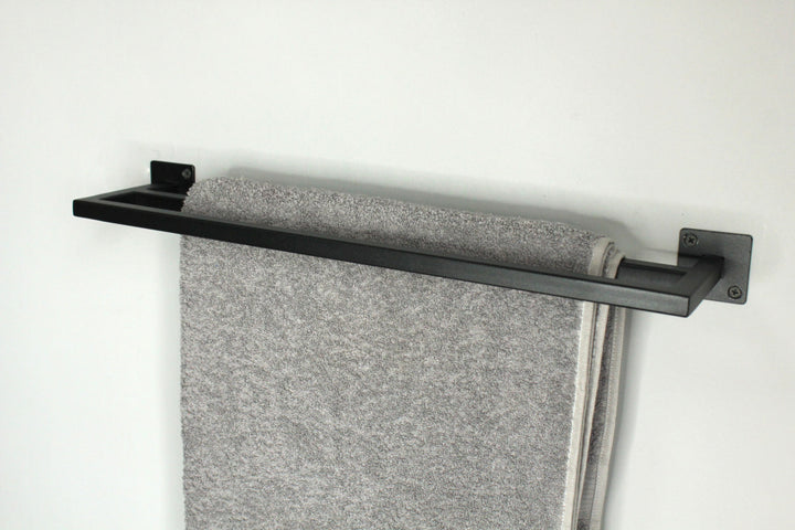 towel-rack-with-multiple-bars-for-hanging-towels-sturdy-metal-frame