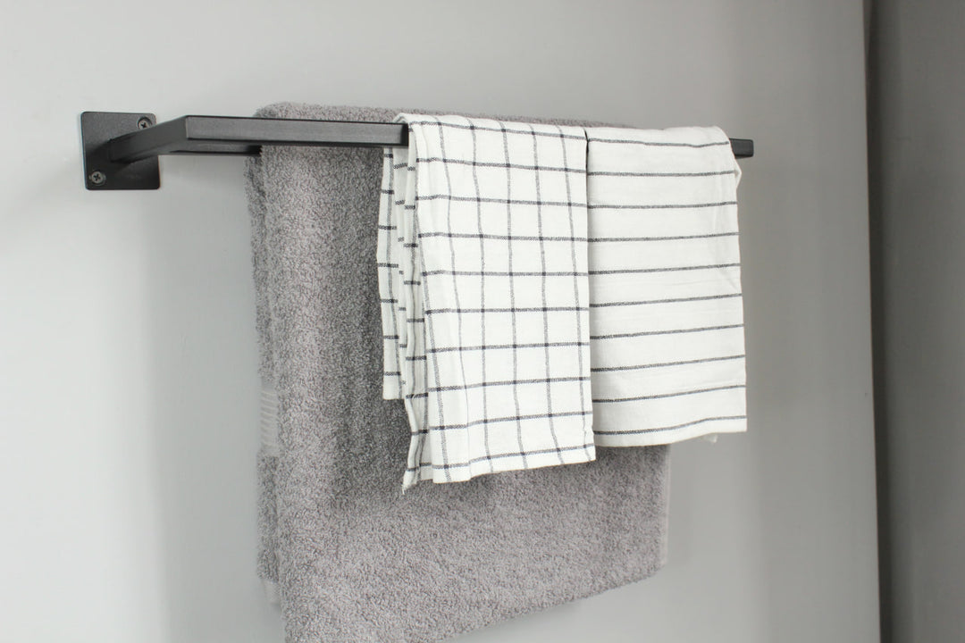 towel-rack-with-multiple-bars-for-hanging-towels-sturdy-metal-frame