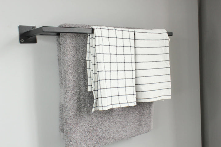 towel-rack-with-multiple-bars-for-hanging-towels-sturdy-metal-frame