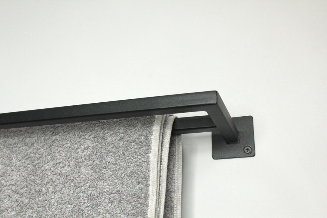 towel-rack-with-multiple-bars-for-hanging-towels-sturdy-metal-frame