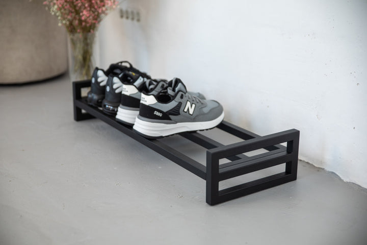 Rustic-industrial-shoe-rack-with-metal-shelves-and-frame