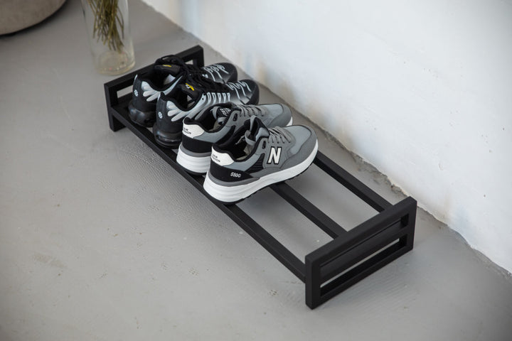 Rustic-industrial-shoe-rack-with-metal-shelves-and-frame