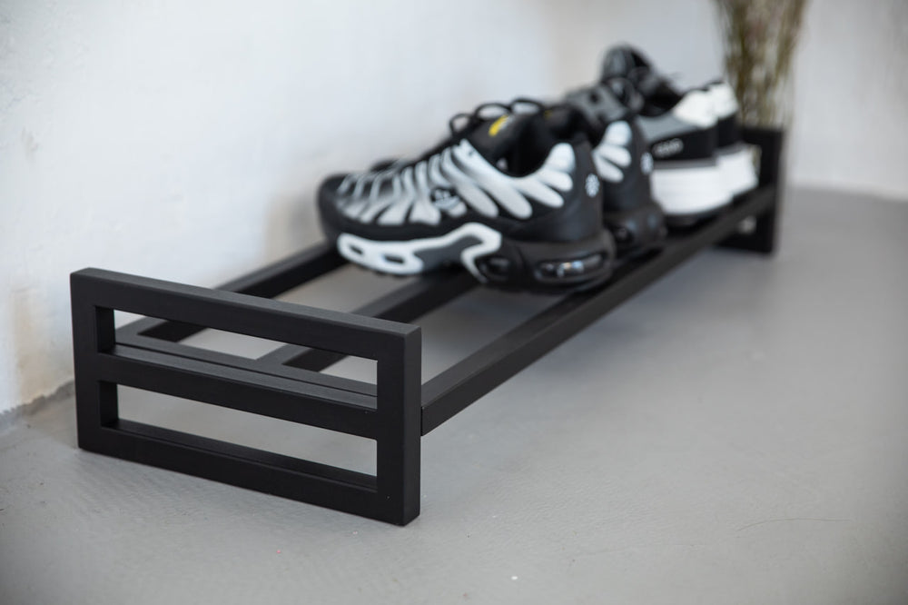 Rustic-industrial-shoe-rack-with-metal-shelves-and-frame