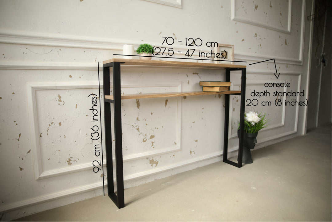 Slim-wood-and-metal-console-table-placed-along-a-hallway-wall
