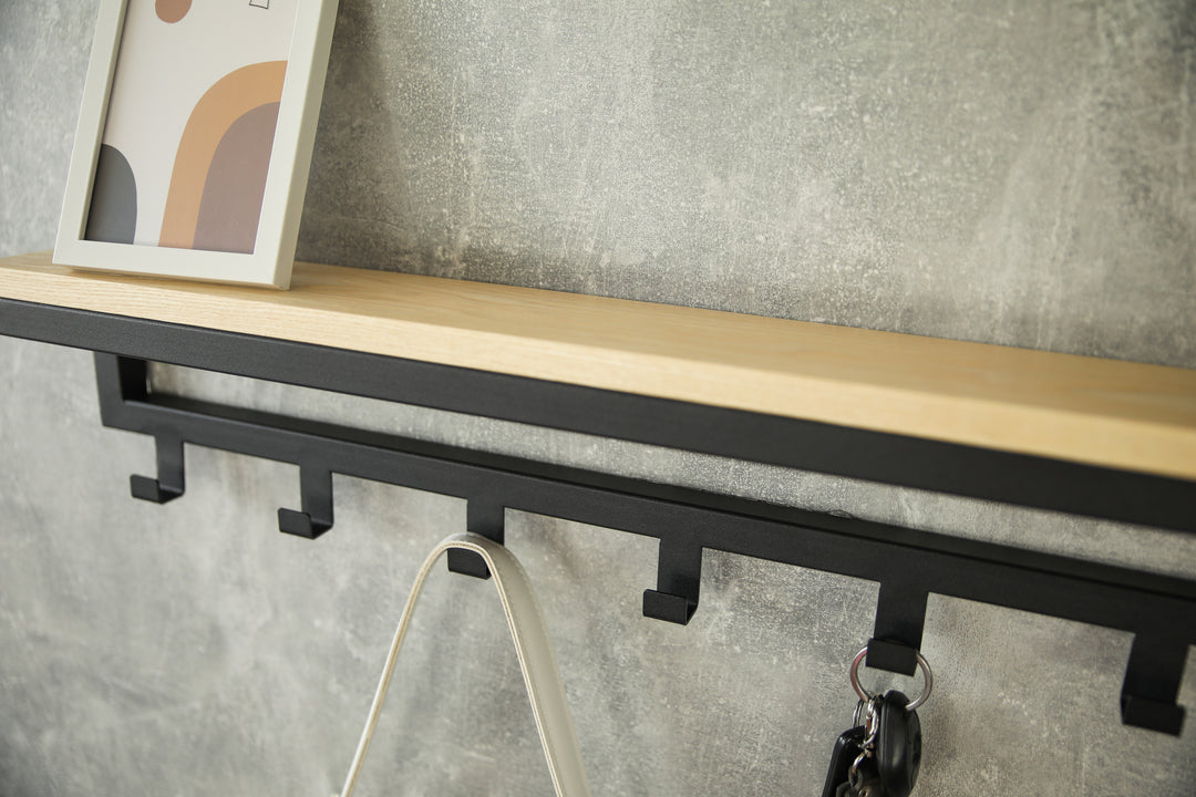 Entryway-wall-shelf-with-hooks-perfect-for-organizing-coats-bags-and-keys