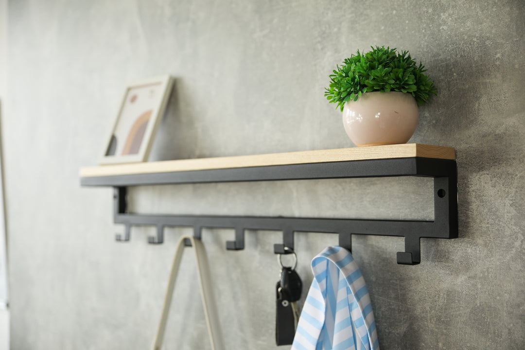 Entryway-wall-shelf-with-hooks-perfect-for-organizing-coats-bags-and-keys