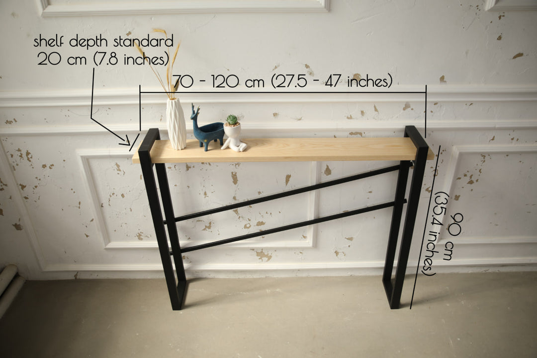 slim-wood-and-metal-console-table-placed-along-a-hallway-wall
