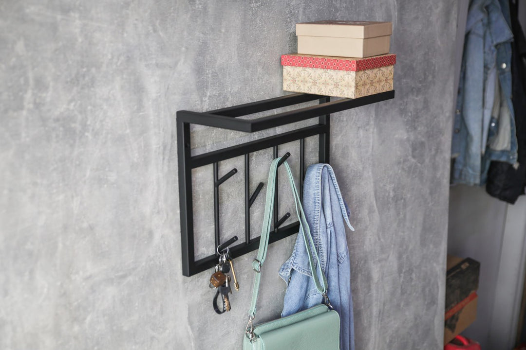 Modern-black-metal-wall-shelf-with-multiple-hooks