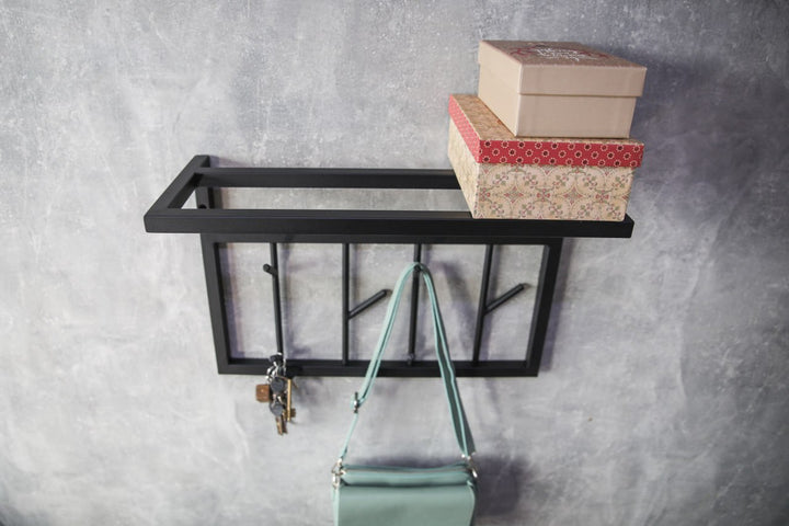 Modern-black-metal-wall-shelf-with-multiple-hooks