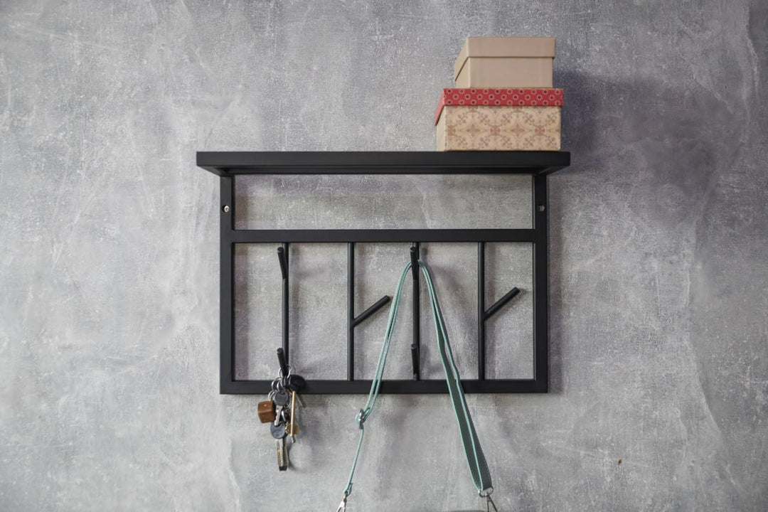 Modern-black-metal-wall-shelf-with-multiple-hooks