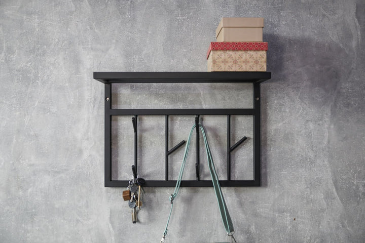 Modern-black-metal-wall-shelf-with-multiple-hooks