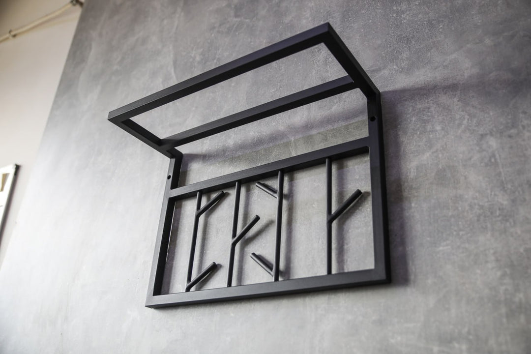 Modern-black-metal-wall-shelf-with-multiple-hooks