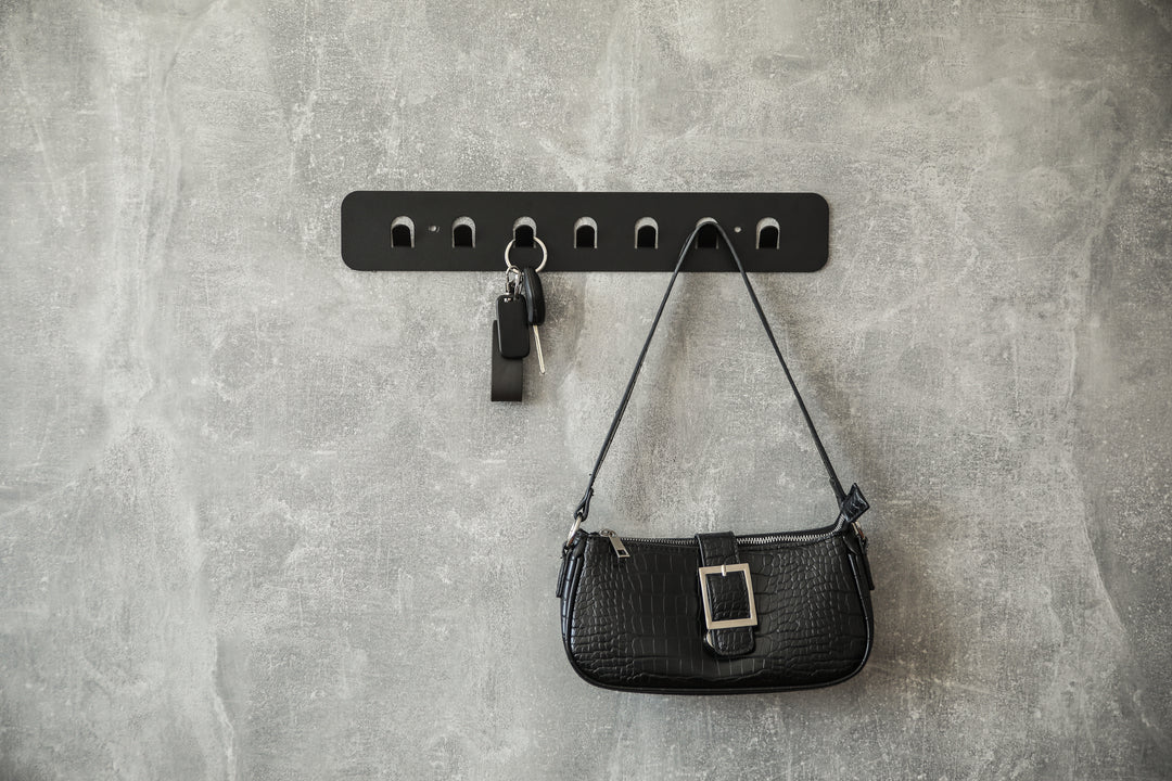 Minimalist-metal-key-hanger-with-sturdy-hooks-designed-for-keeping-keys-clothes