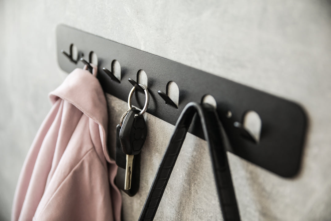 Minimalist-metal-key-hanger-with-sturdy-hooks-designed-for-keeping-keys-clothes