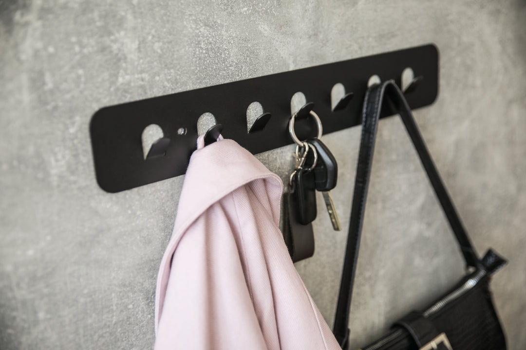 Minimalist-metal-key-hanger-with-sturdy-hooks-designed-for-keeping-keys-clothes