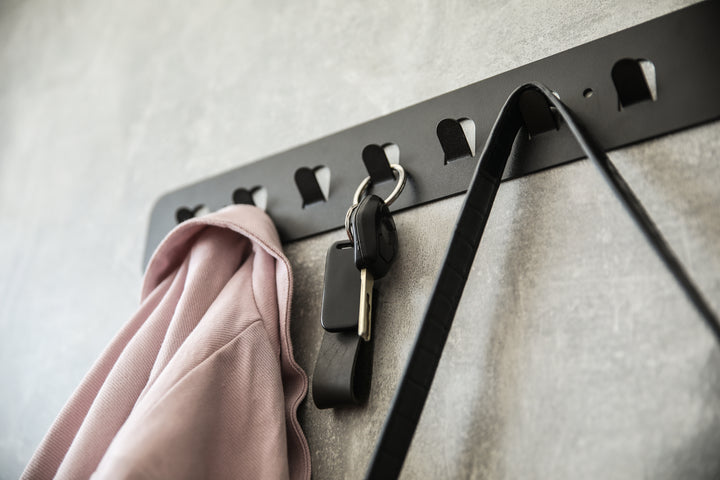 Minimalist-metal-key-hanger-with-sturdy-hooks-designed-for-keeping-keys-clothes