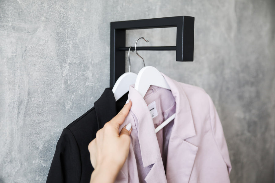 Contemporary-wall-mounted-clothes-hanger-with-a-practical-design