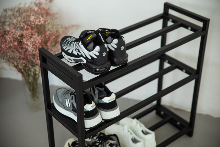 Metal-multi-tier-shoe-rack-with-sneakers-and-boots