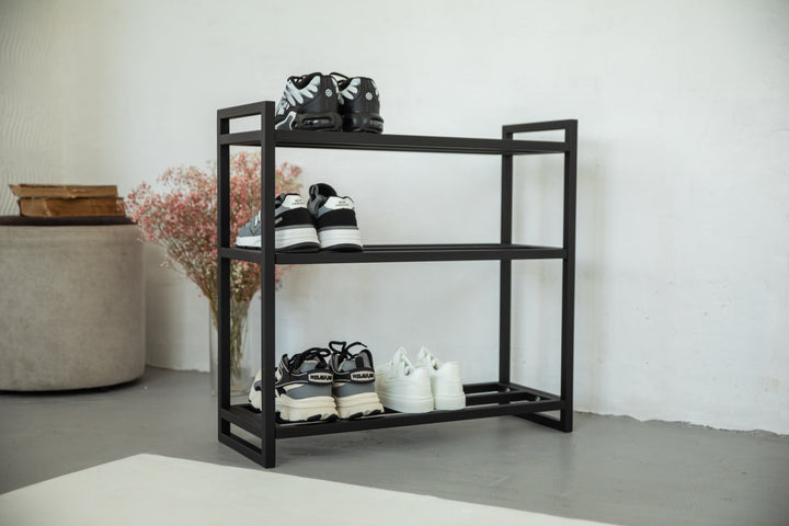 Metal-multi-tier-shoe-rack-with-sneakers-and-boots