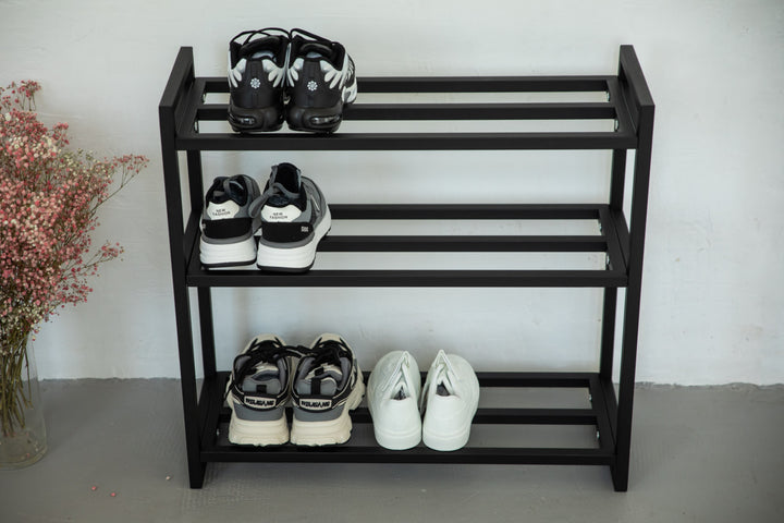 Metal-multi-tier-shoe-rack-with-sneakers-and-boots