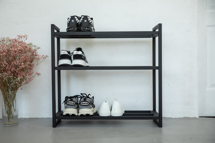 Metal-multi-tier-shoe-rack-with-sneakers-and-boots