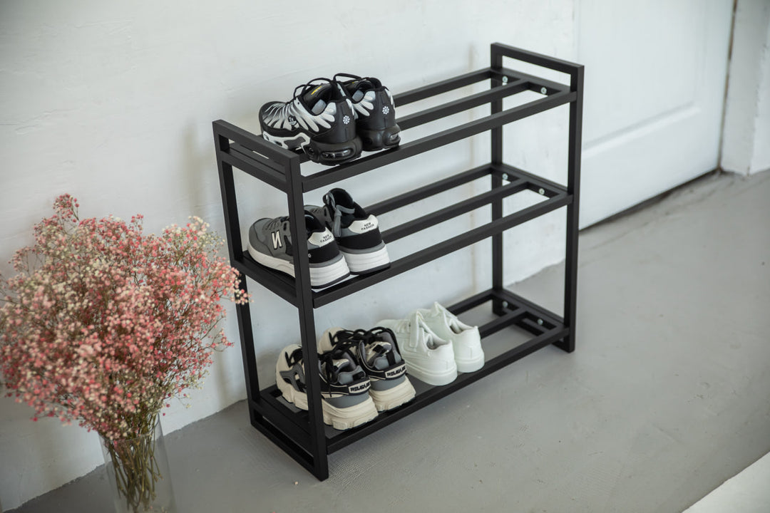 Metal-multi-tier-shoe-rack-with-sneakers-and-boots