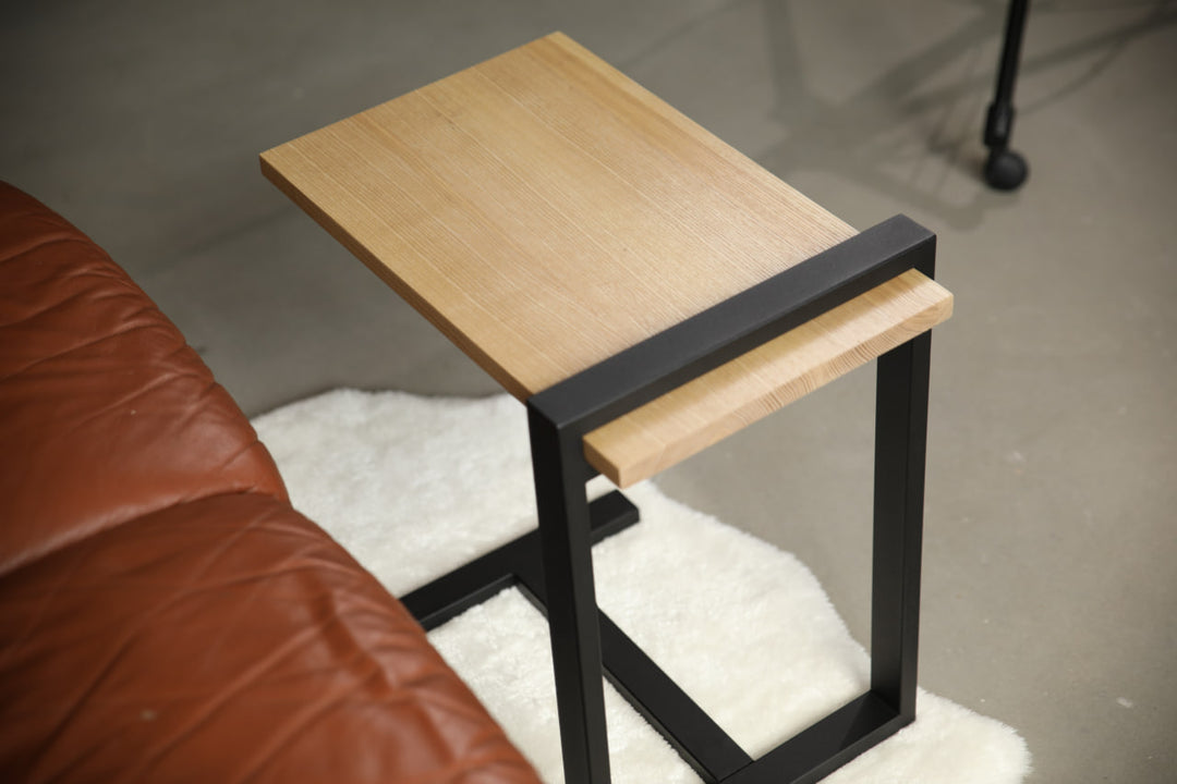 bedside-table-features-a-sleek-minimalist-design-with-a-solid-wood-top-and-a-sturdy-black-metal-frame