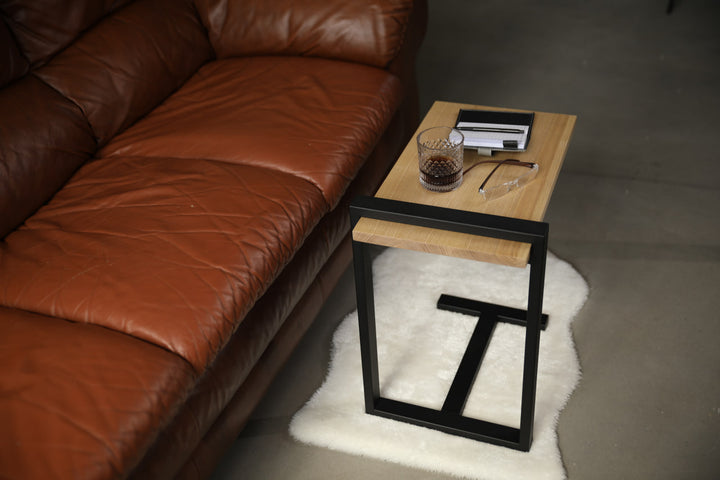 bedside-table-features-a-sleek-minimalist-design-with-a-solid-wood-top-and-a-sturdy-black-metal-frame