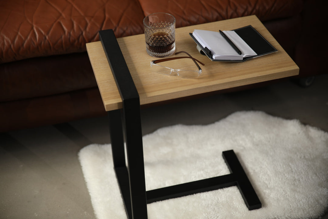 bedside-table-features-a-sleek-minimalist-design-with-a-solid-wood-top-and-a-sturdy-black-metal-frame