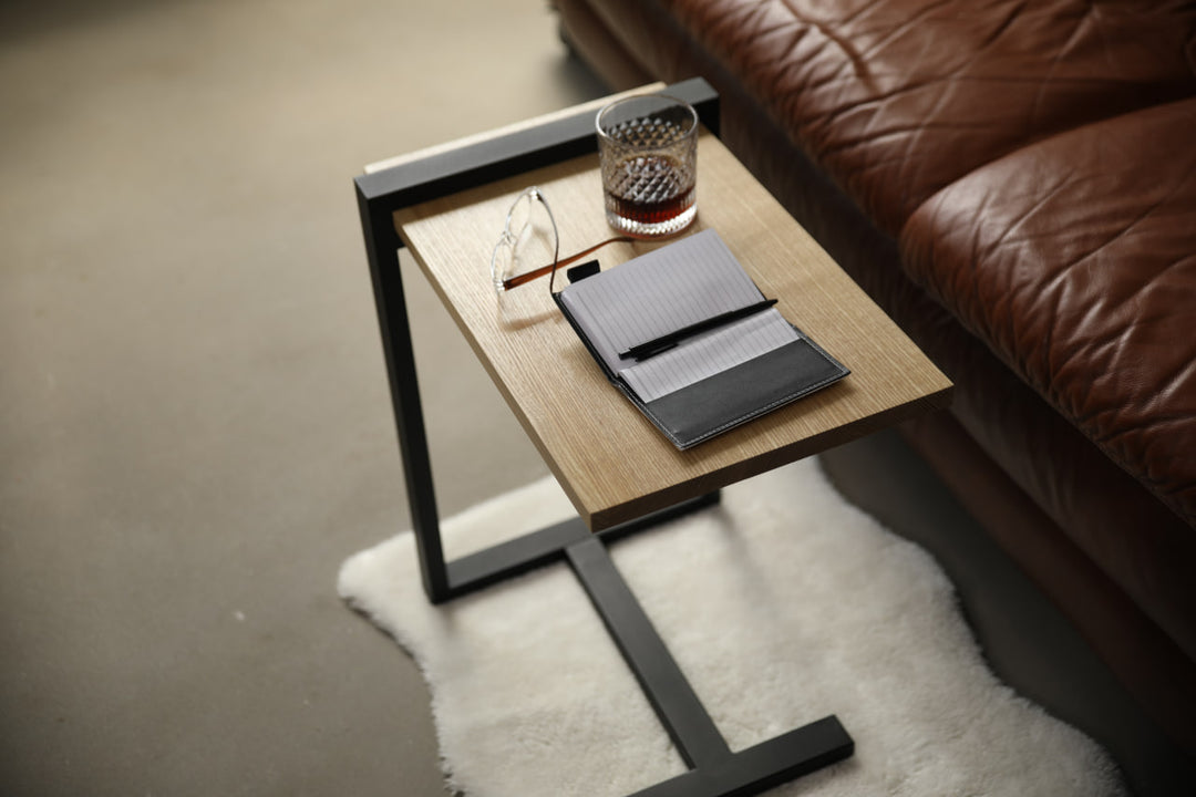 bedside-table-features-a-sleek-minimalist-design-with-a-solid-wood-top-and-a-sturdy-black-metal-frame