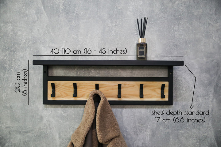Space-saving-wall-mounted-hanger-with-shelf-and-multiple-hooks-for-coats-bags-and-hats