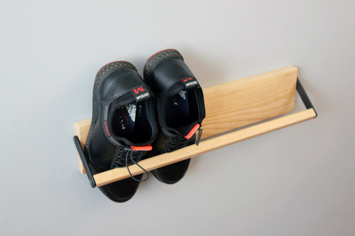 Sleek-and-practical-shoe-storage-solution-with-a-secure-holding-bar