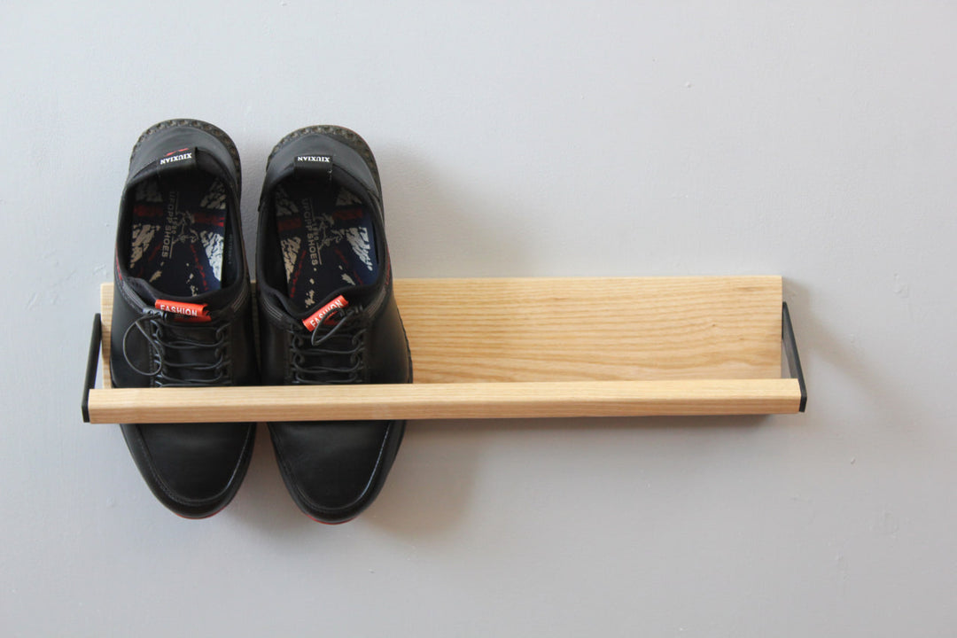 Sleek-and-practical-shoe-storage-solution-with-a-secure-holding-bar