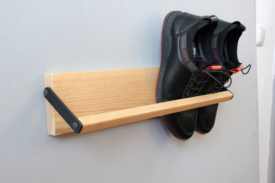 Sleek-and-practical-shoe-storage-solution-with-a-secure-holding-bar