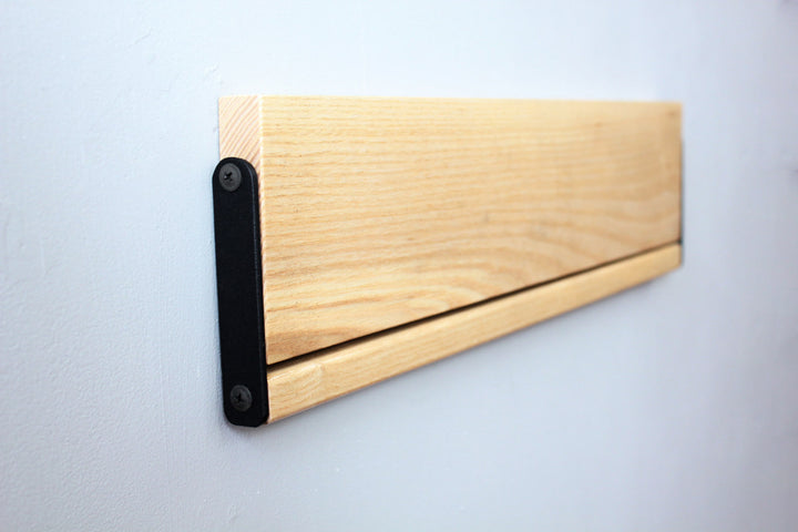 Sleek-and-practical-shoe-storage-solution-with-a-secure-holding-bar