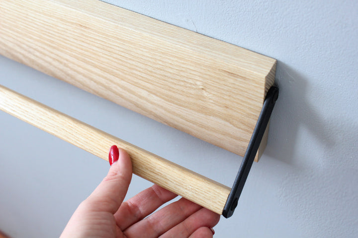 Sleek-and-practical-shoe-storage-solution-with-a-secure-holding-bar